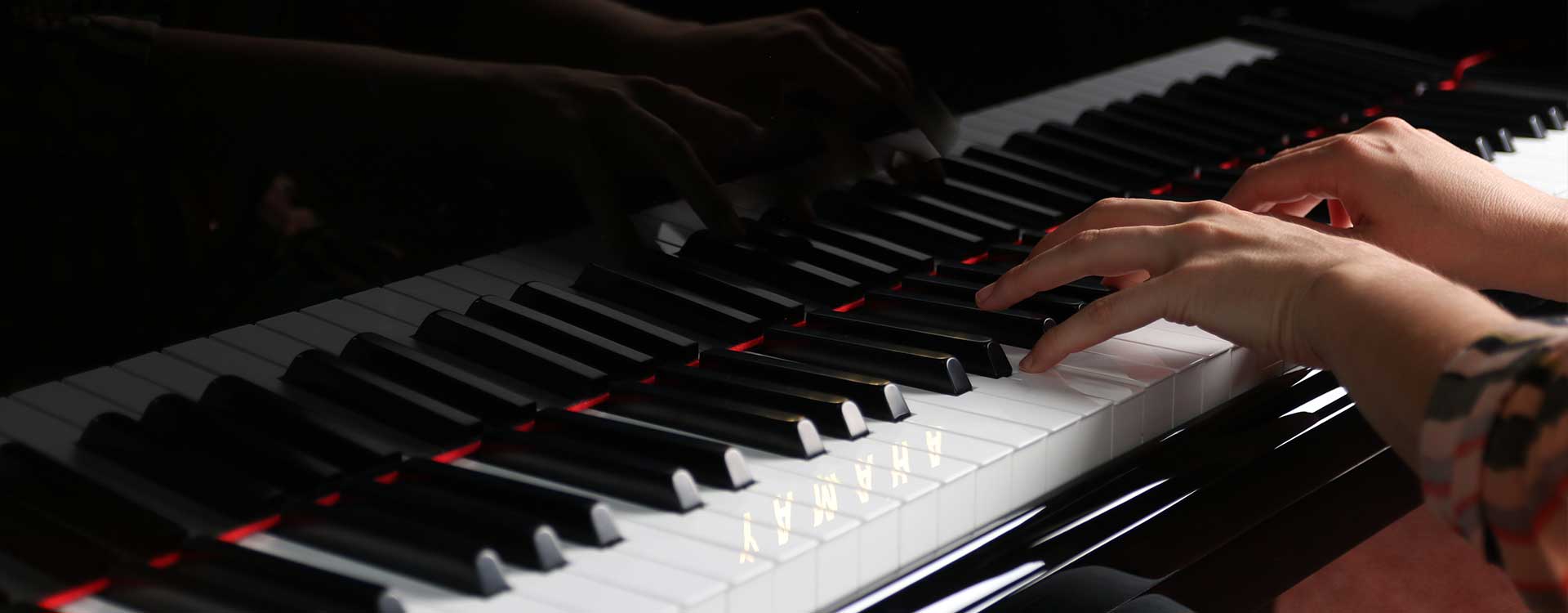 boy learning piano